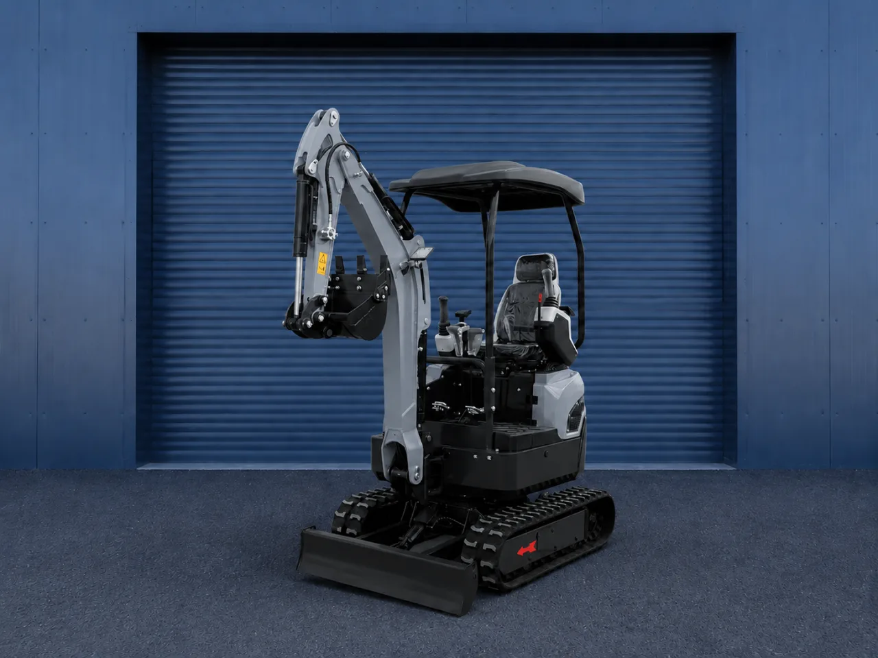 Mini-pelle Xcavator XC15P, vue arrière trois-quarts, bras replié